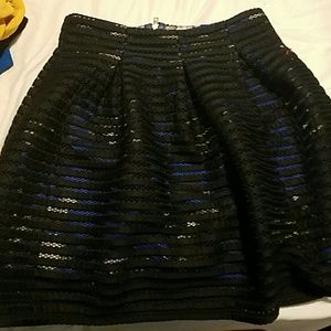 Xhilaration black skirt with blue lining inside